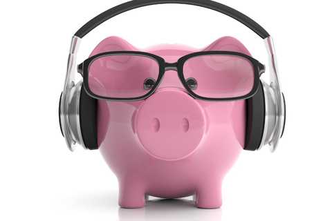 Piggy bank listening to podcast