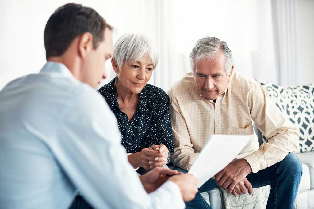 Senior couple getting advice from their financial consultant